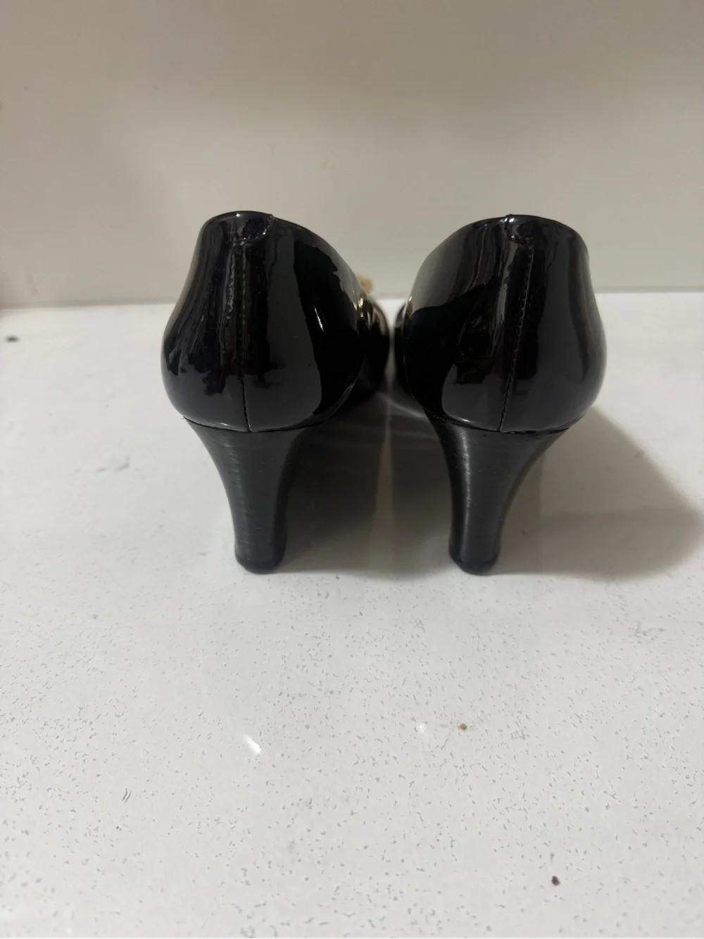 Tory Burch Black Patent Leather Wedge Flats with Gold Logo Medallions